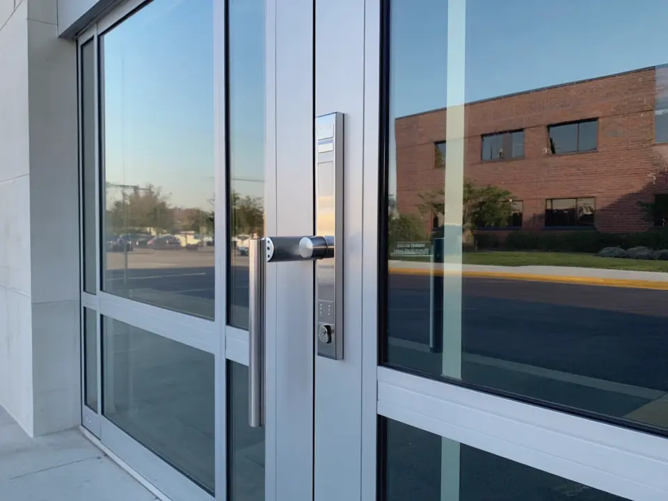 Commercial locksmith helping a business owner during a lockout in Livonia MI